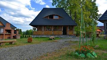 Фото номера Дом с 2 спальнями Дома для отпуска Casuta Bunicii г. Окна-Шугатаг 57