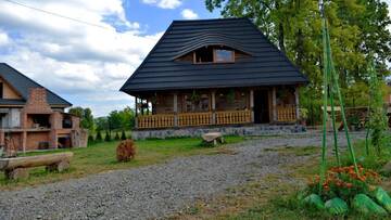 Фотографии Дома для отпуска Casuta Bunicii г. Окна-Шугатаг (Румыния) №1 Фото Дома для отпуска Casuta Bunicii г. Окна-Шугатаг 1