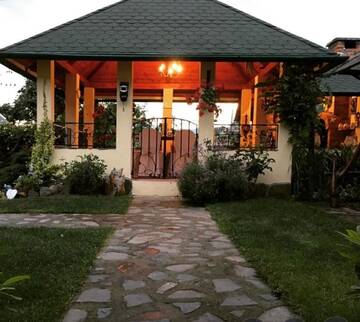 Фото номера Апартаменты с видом на сад Гостевой дом Casa Moldovan ( Coltisorul meu de rai) г. Окна-Шугатаг 27